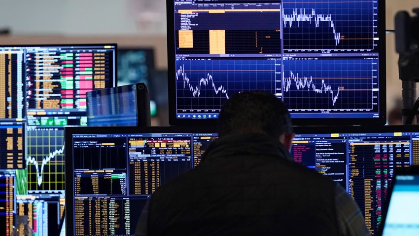 A trader works on the floor of the New York Stock Exchange.