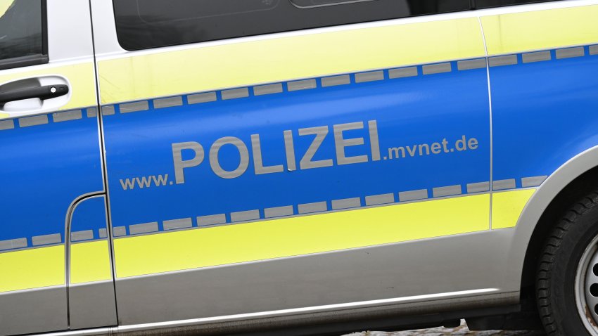 A police car stands in front of a hotel in the Baltic seaside resort of Heringsdorf